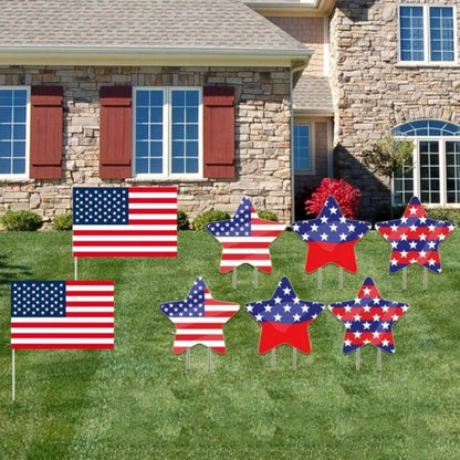 Decorative American flags and star-shaped yard signs 