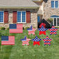 Decorative American flags and star-shaped yard signs 