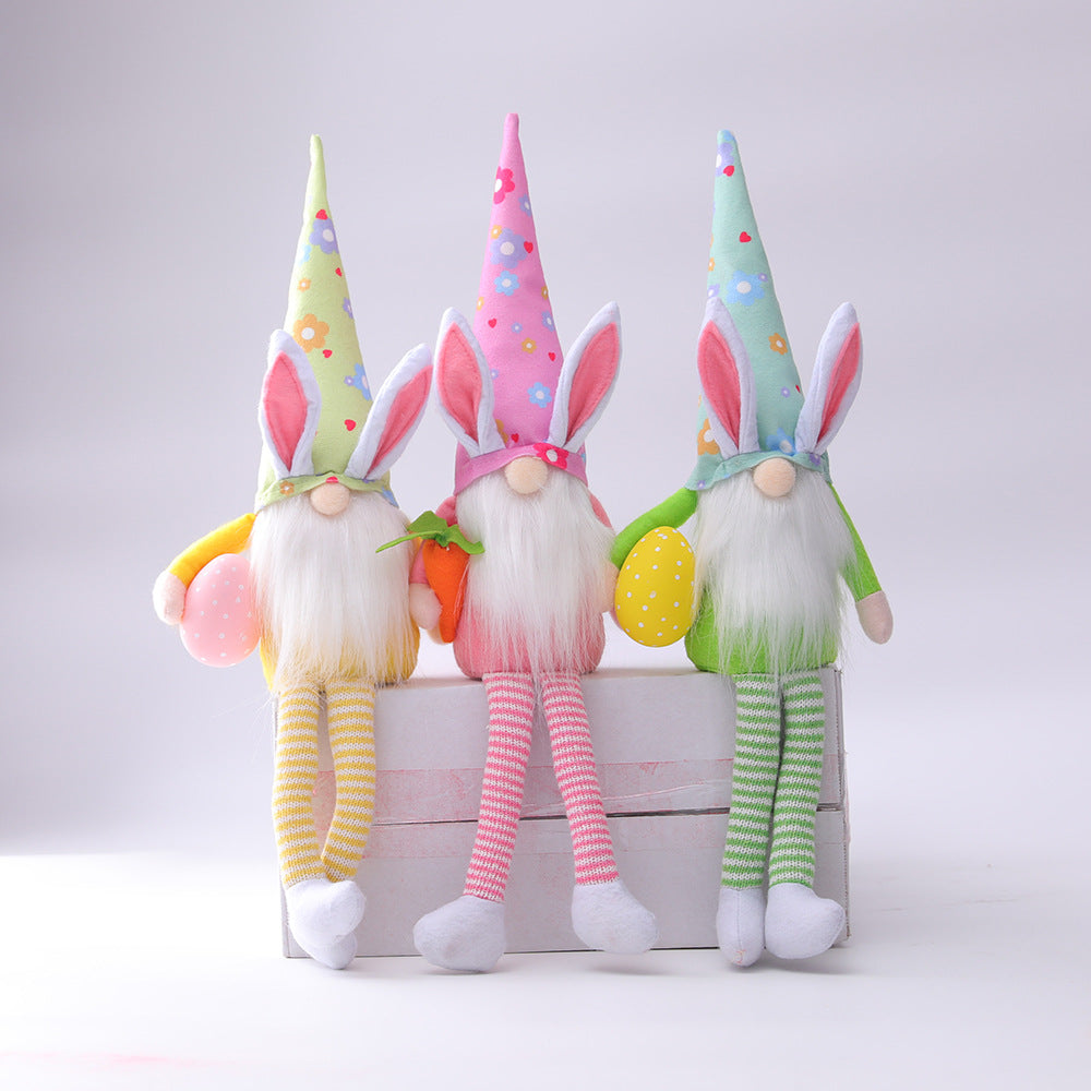 colorful gnome figurines with bunny ears and spring-themed hats Easter decoration