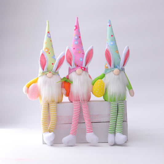 colorful gnome figurines with bunny ears and spring-themed hats Easter decoration
