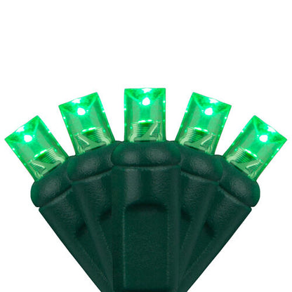 Close-up of green 5mm wide angle LED Christmas lights on green wire
