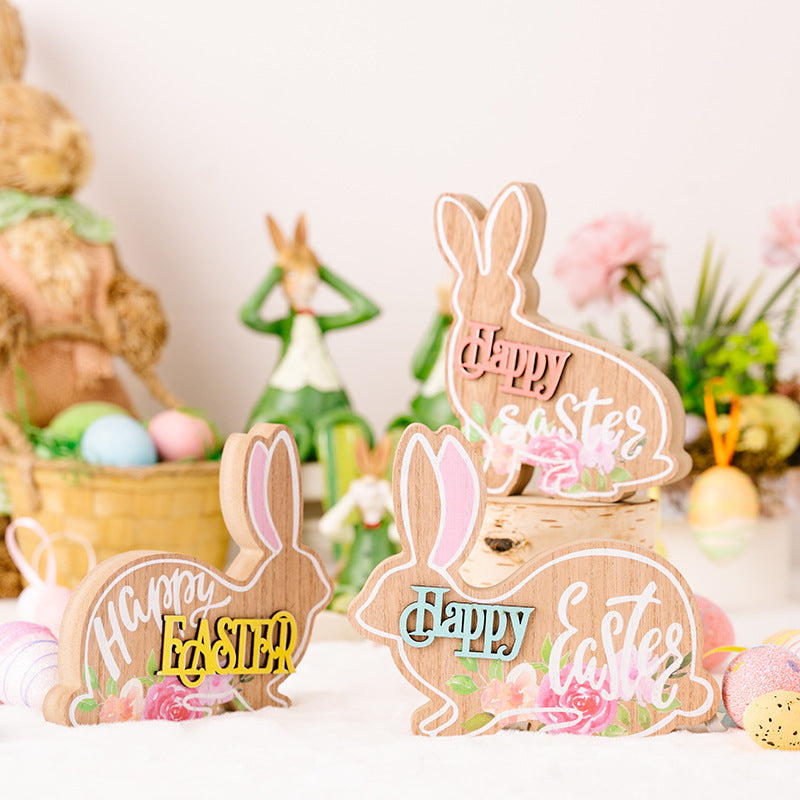 Wooden bunny-shaped 'Happy Easter' decoration with floral decorations