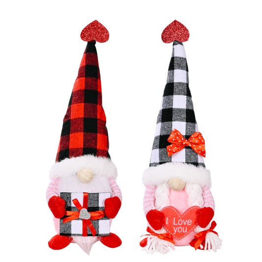 Two Valentine-themed gnomes with plaid patterns and heart designs on a white background.