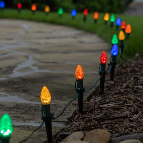 Multicolor C7 OptiCore LED Christmas pathway lights with PathPRO stakes in six colors