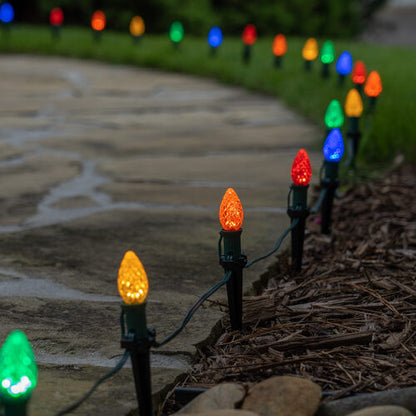 Multicolor C7 OptiCore LED Christmas pathway lights with PathPRO stakes in six colors