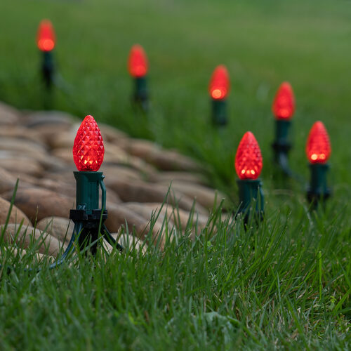 Red C7 OptiCore LED Christmas pathway lights with PathPRO stakes in six colors