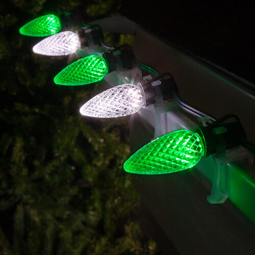 Green white C9 OptiCore LED Christmas string lights on green wire