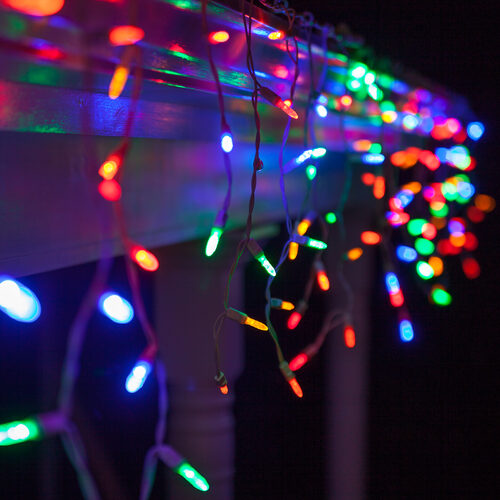 Multicolor 70 LED M5 icicle Christmas lights on white wire