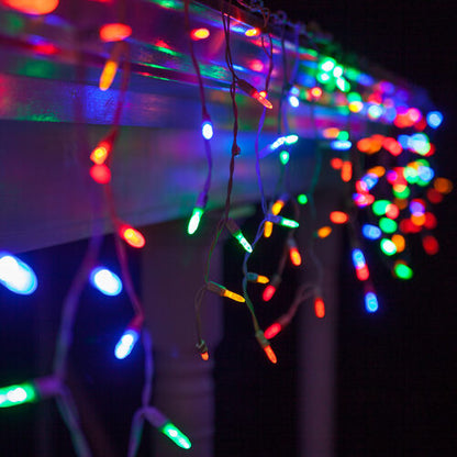 Multicolor 70 LED M5 icicle Christmas lights on white wire