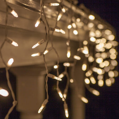 Warm White 70 LED M5 icicle Christmas lights on white wire