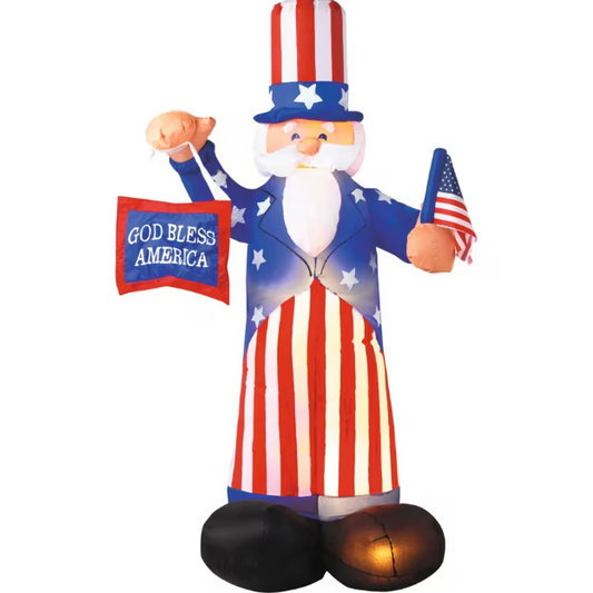 Inflatable Uncle Sam figure holding an American flag and 'God Bless America' sign 4th of July decoration