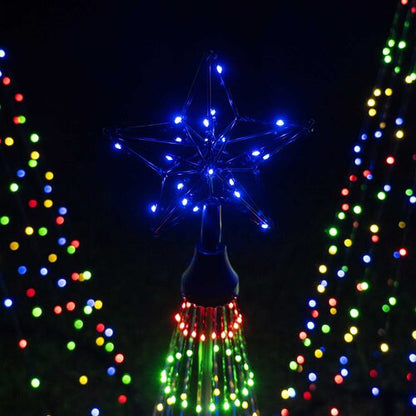 Close-up of glowing blue LED star topper on a Wintergreen Lighting multicolor animated Christmas light show tree.