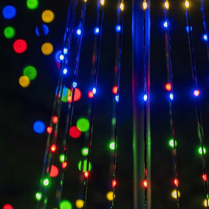 Close-up of red, green, blue and warm white multicolor LED lights on a black-wire animated Christmas light show tree.