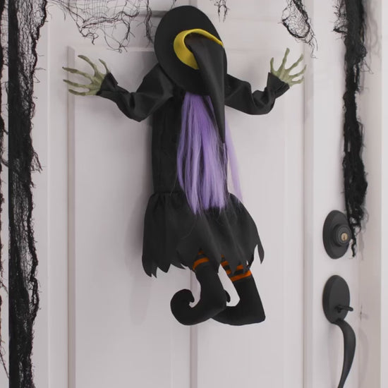 29" Kicking Crashed Witch Animated Halloween Decoration